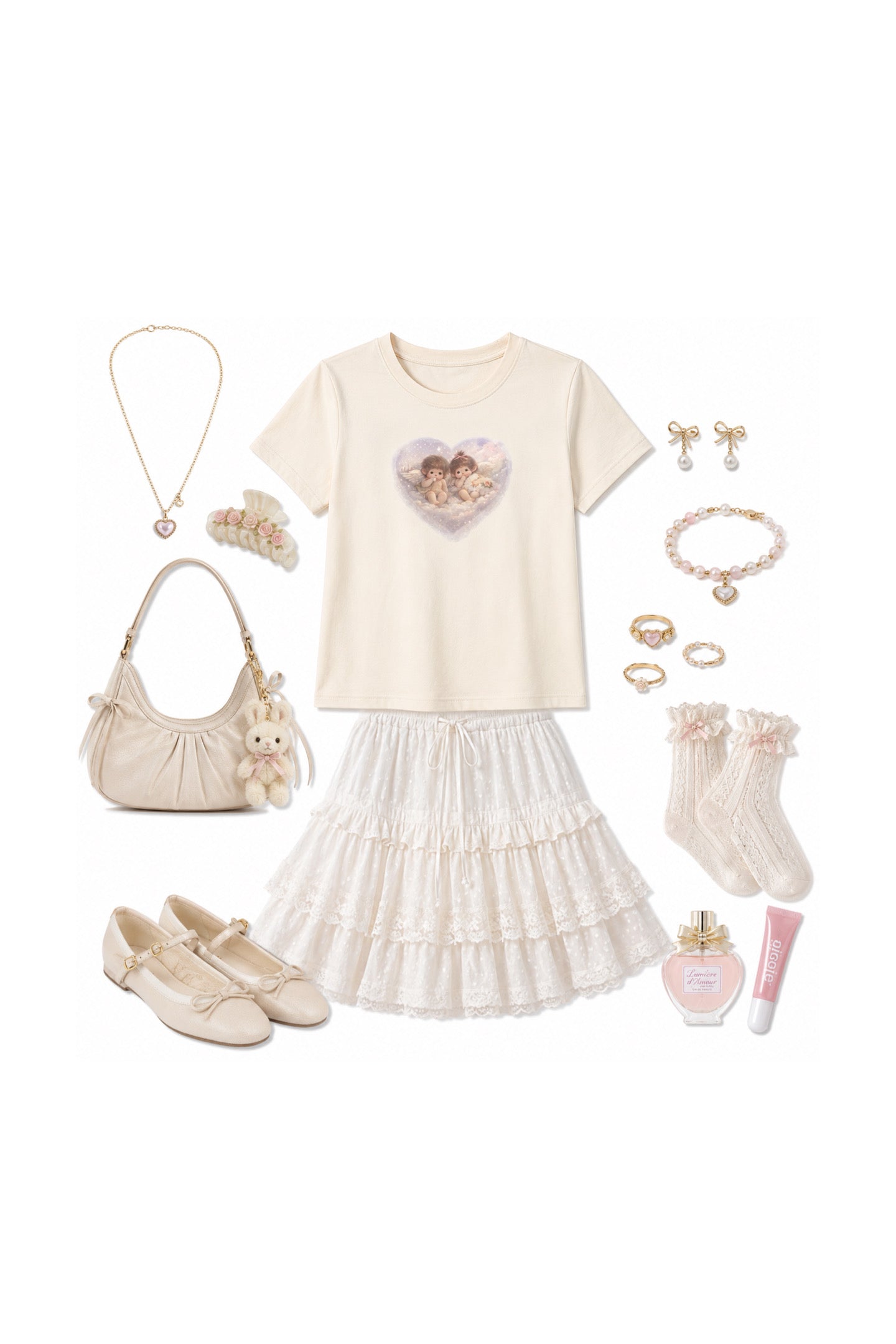 A girls' outfit flat lay featuring a cream short-sleeve t-shirt with a heart-shaped cherub 